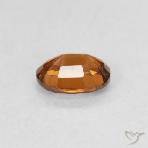زركون Medium Dark-Orange طبيعي، بيضوي، 0.60 قيراط، قليلا جدا