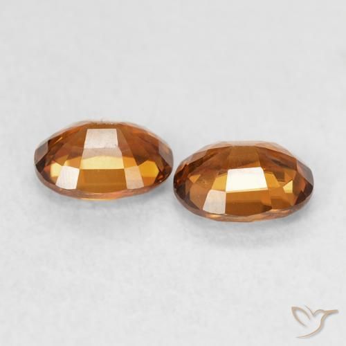 أحجار زركون Medium Dark-Orange طبيعية، بيضوي، VVS، وزنها 1.18 قيراط
