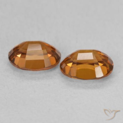 أحجار زركون Medium Dark-Orange طبيعية، بيضوي، VVS-VS، وزنها 1.27 قيراط