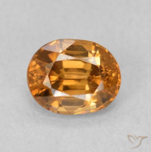 0.95ct طبيعي بنى برتقالى زركون, بيضوي, قليلا جدا