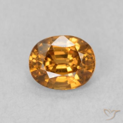 0.67ct طبيعي بنى برتقالى زركون, بيضوي, قليلا جدا