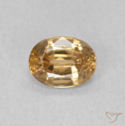 0.57ct طبيعي خوخى-ذهبى زركون, بيضوي, قليلا جدا