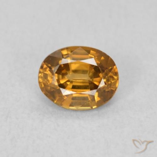 0.60ct طبيعي بنى برتقالى زركون, بيضوي, VVS