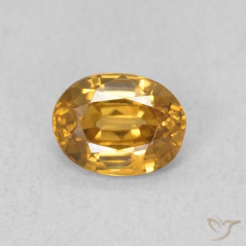 0.57ct طبيعي برتقالى-ذهبى زركون, بيضوي, VVS-VS