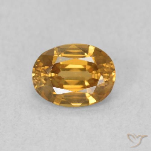 0.62ct طبيعي برتقالى-ذهبى زركون, بيضوي, VVS