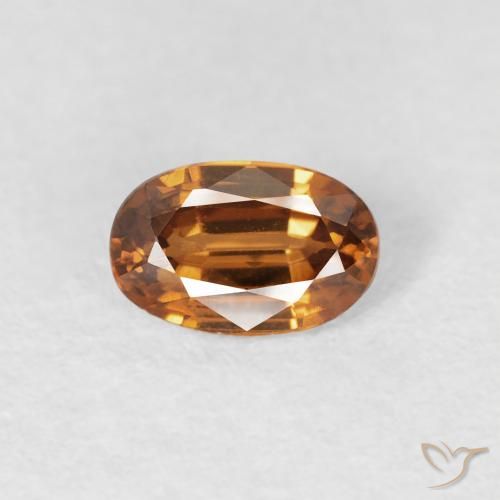 0.74ct طبيعي برتقالى متوسط زركون, بيضوي, قليلا جدا