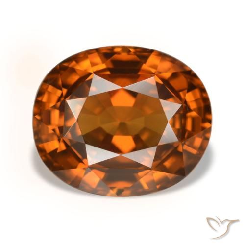 زركون طبيعي بلون Medium Dark-Orange، وزن ‎5.52‎ قيراط، شكل بيضاوى، مقاس ‎10.5x8.8‎ مم