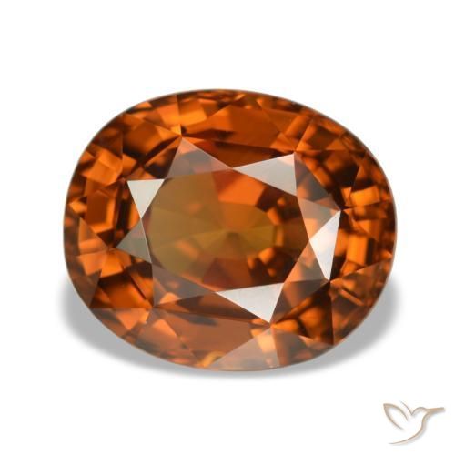 زركون طبيعي بلون Medium Dark-Orange، وزن ‎5.52‎ قيراط، شكل بيضاوى، مقاس ‎10.5x8.8‎ مم